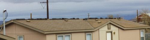 [What a windstorm can do to a new roof!]